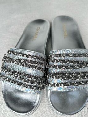 SOLD.     CHANEL Silver Iridescent Chain-Trim Slides